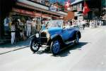 Oldtimer Ford am 7. August 1988 in Adelboden, Landstrasse (Festumzug 100 Jahre Kur- und Verkehrsverein Adelboden)